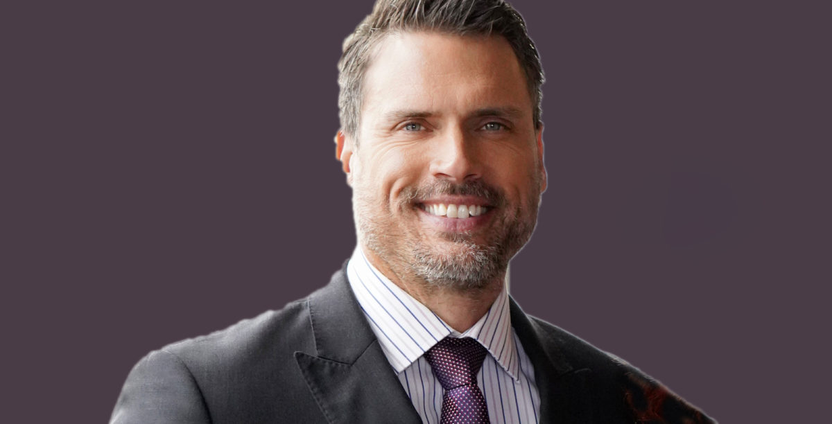 joshua morrow of the young and the restless smiling against a purple background