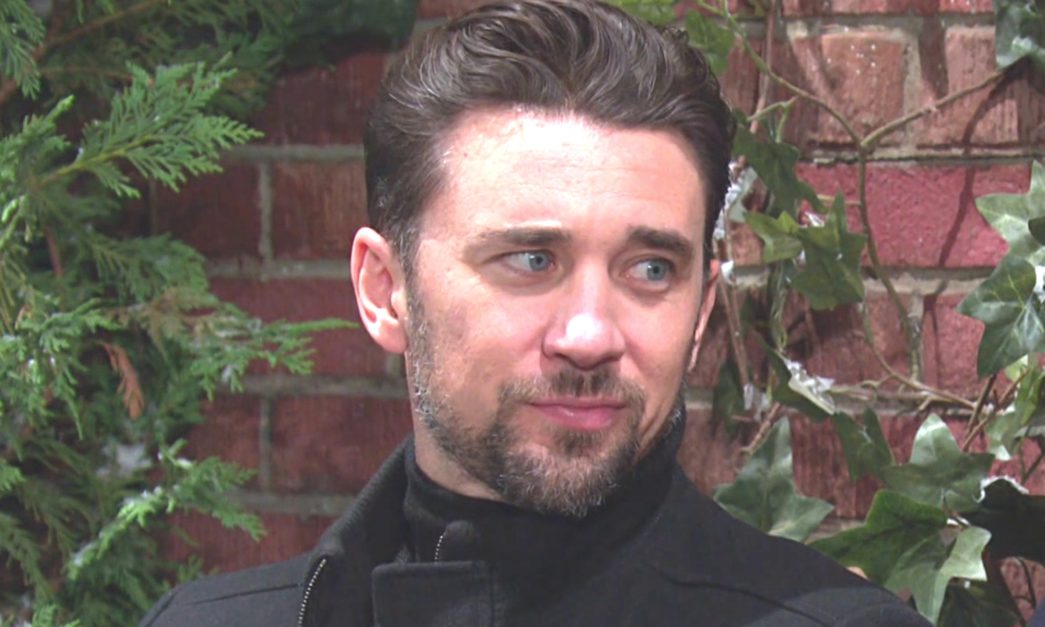 chad dimera of Days of our Lives wearing a black turtleneck outside on a bench