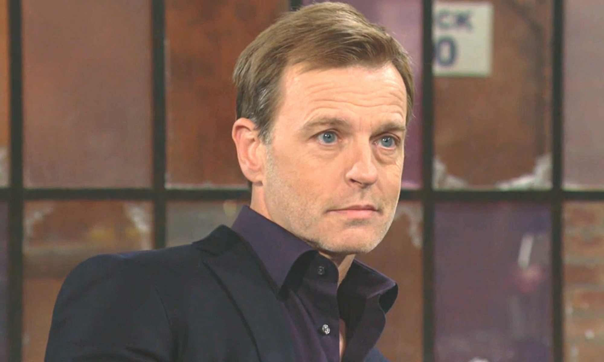 tucker mccall wearing a crisp purple shirt at society on young and the restless