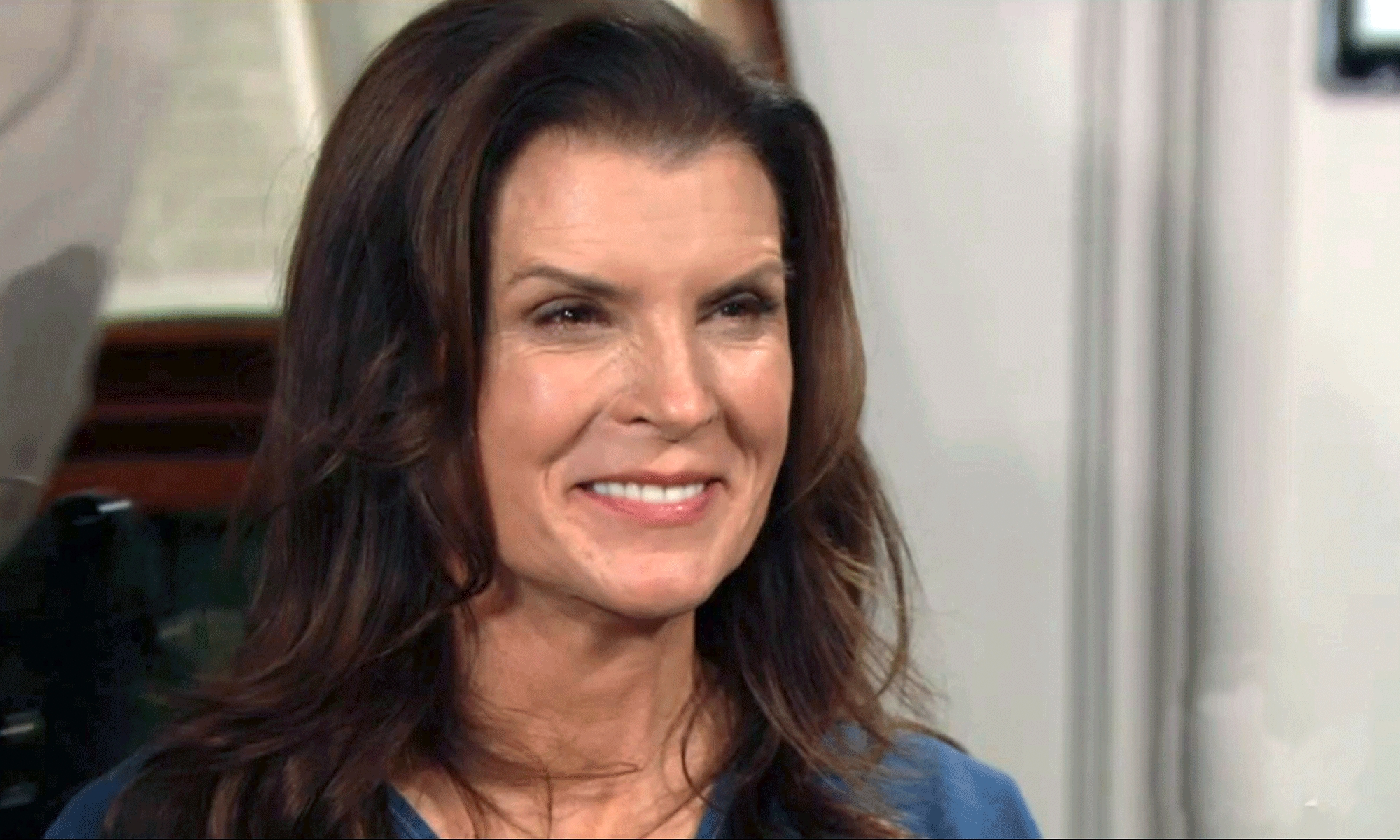 sheila carter smiling after being told she's going free on bold and the beautiful