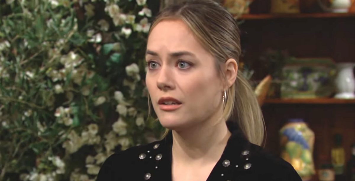bold and the beautiful spoilers hope logan spencer looks worried in front of a plant
