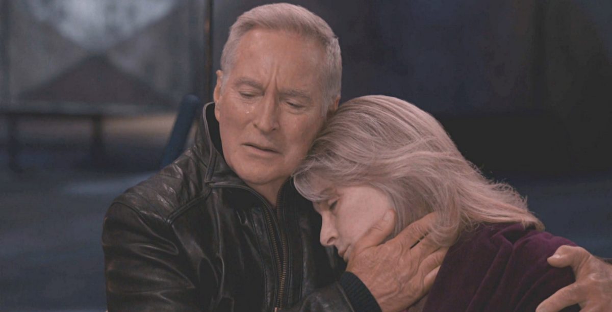 a concerned john wraps a seemingly deceased marlena evans up in his arms in days of our lives recap