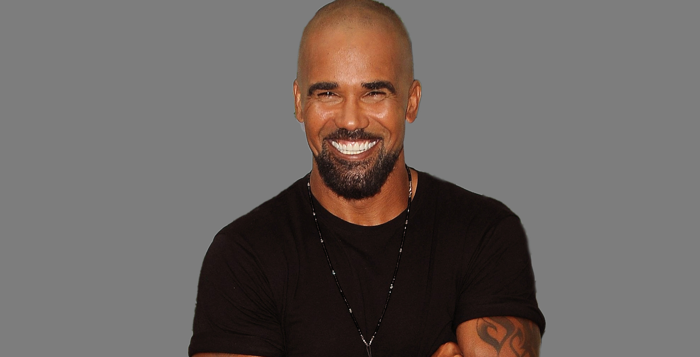 shemar moore wearing black on a gray background young and the restless