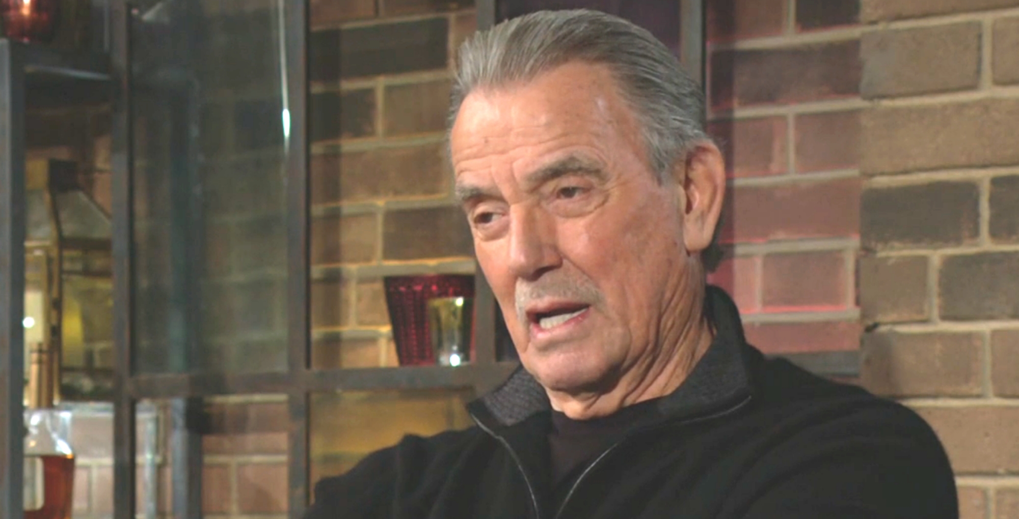 victor newman wearing black against a brick wall young and the restless recap for january 23, 2023