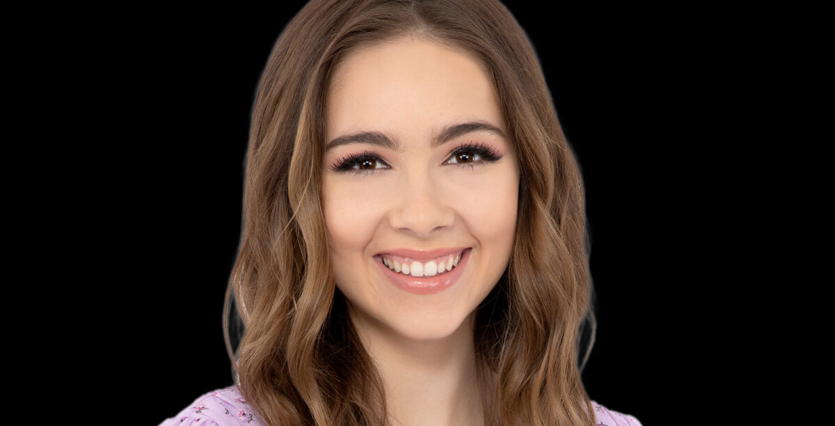 haley pullos from general hospital against a black background.