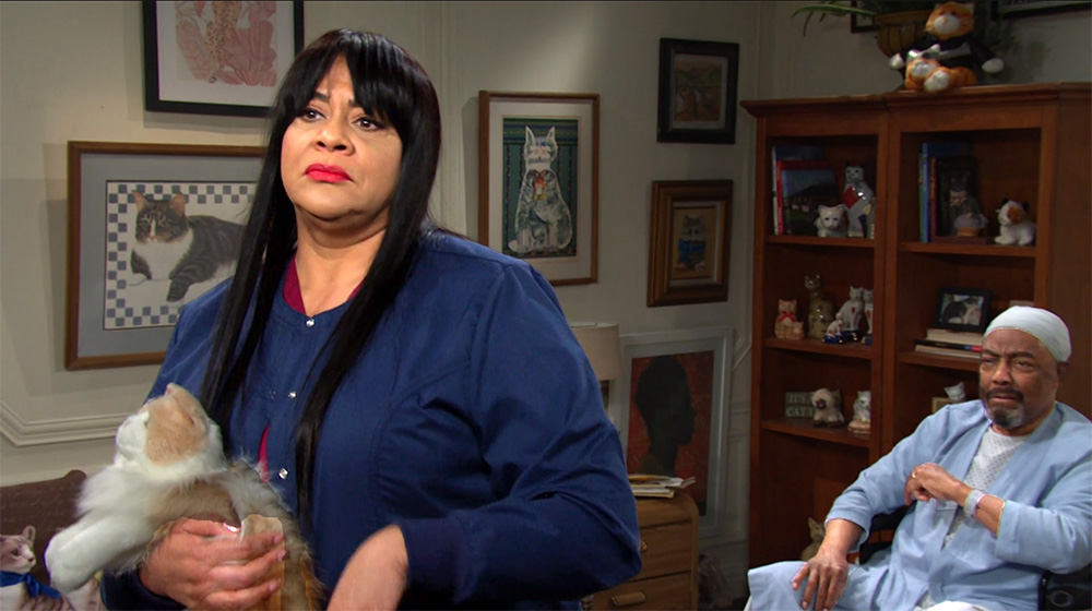 days of our lives recap for thursday, june 1, 2023, whitley holds a stuffed cat as abe looks on.