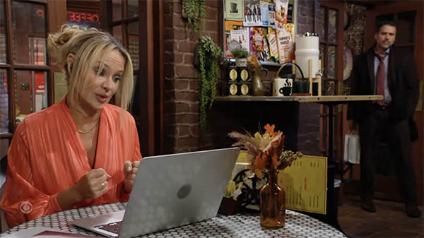 nick notices sharon having a video meeting on the patio at crimson lights on young and the restless.