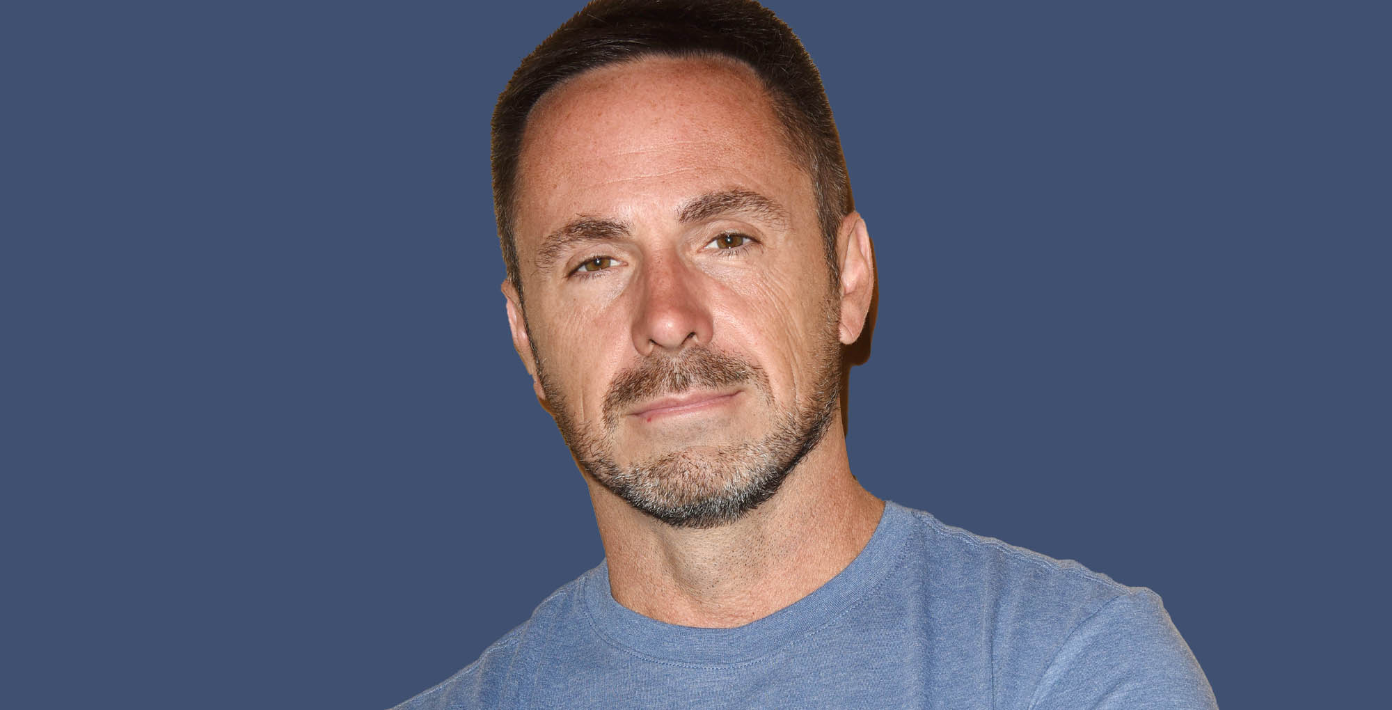 general hospital and bold and the beautiful alum william devry against a blue background.