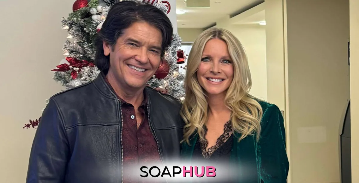 The Young and the Restless Michael Damian and Lauralee Bell in front of a Christmas Tree with the Soap Hub logo.