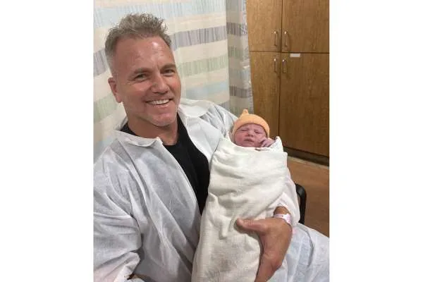 Sean Carrigan holding Susan Maxine Carrigan.